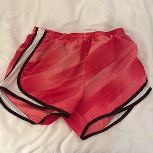 Pink Nike athletic shorts